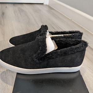 Birdies faux fur slip on tennis shoes size 8. Black